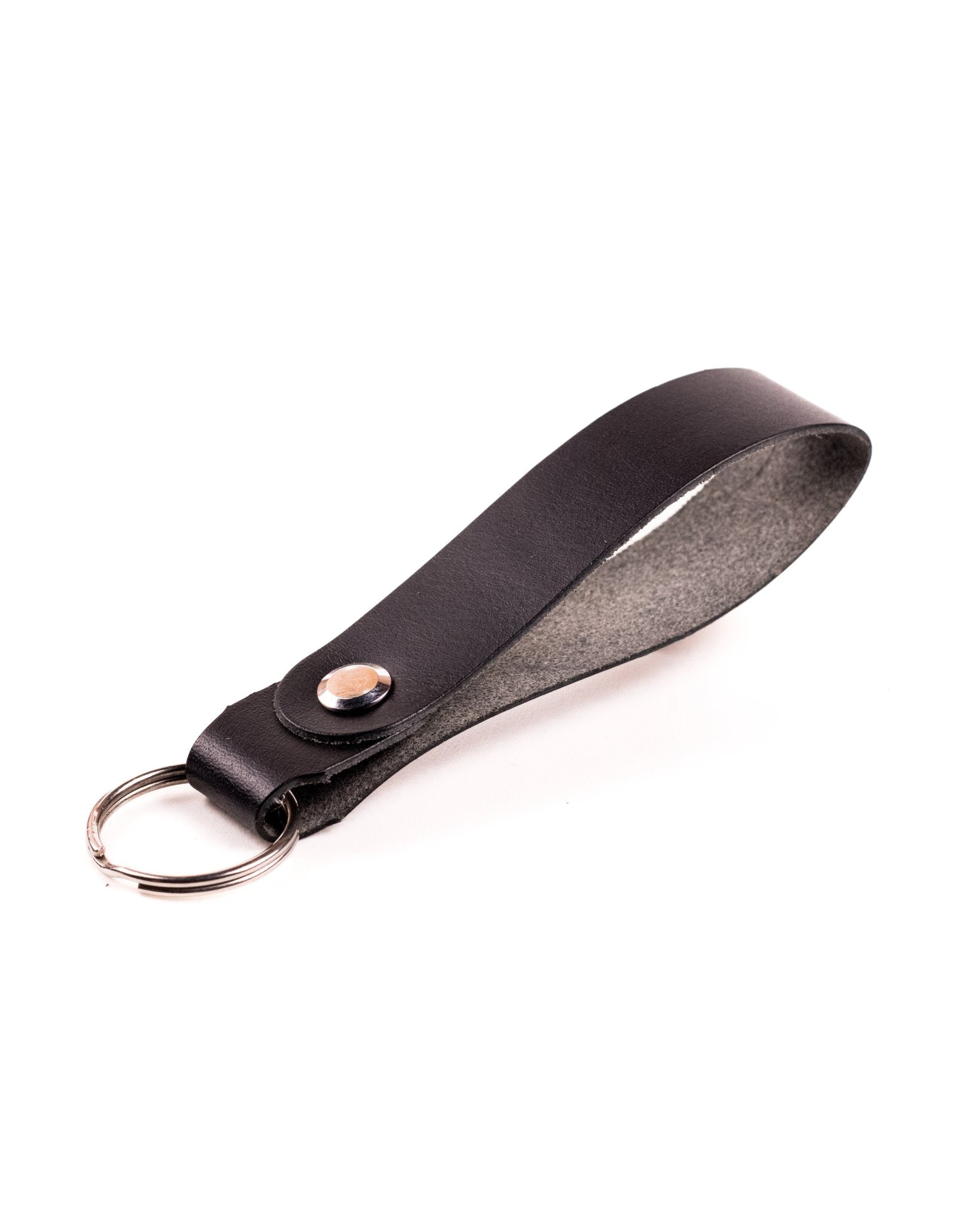 black italian leather keyring with silver hardware on a white background
