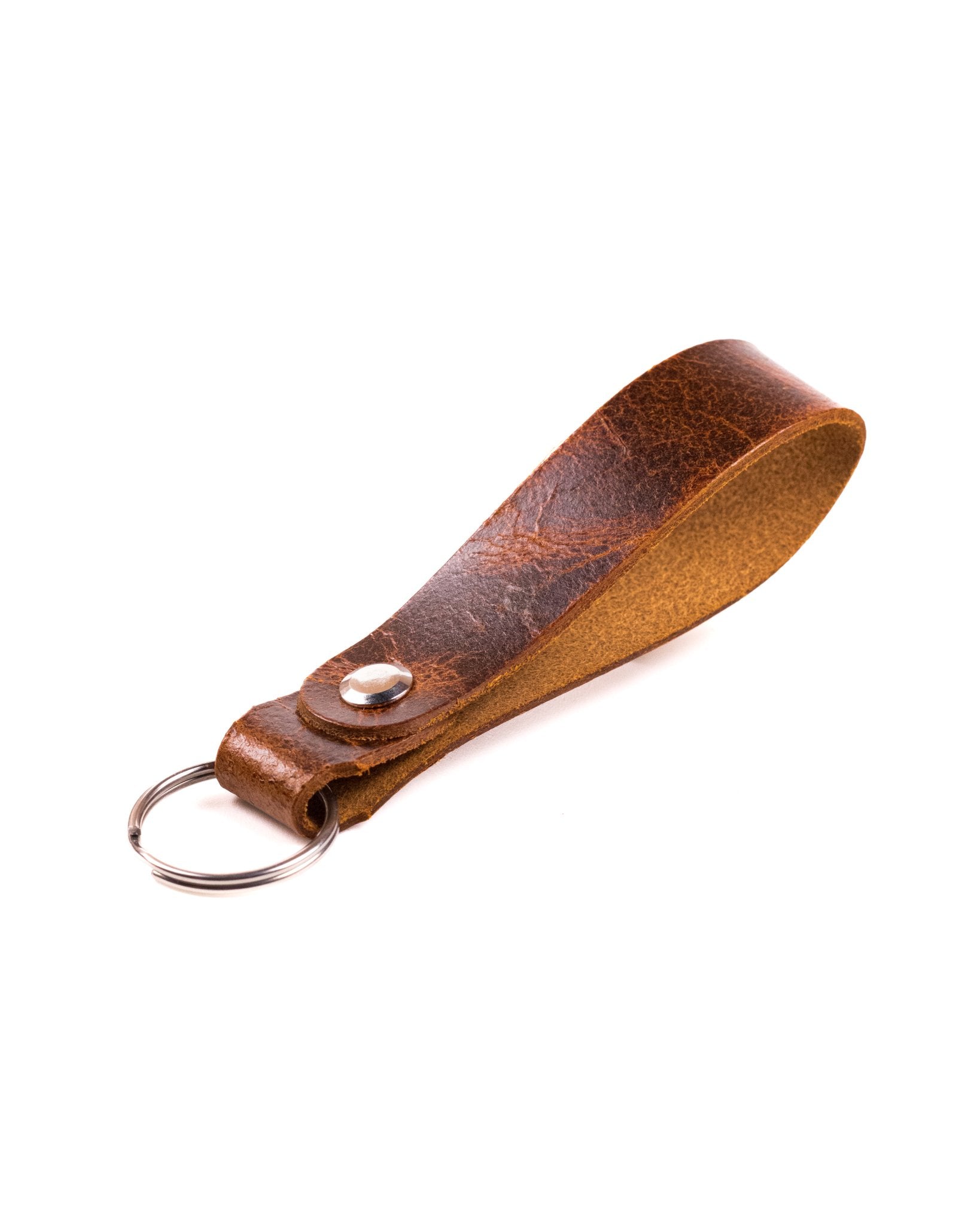 Tan Distressed leather keyring with silver hardware on a white background