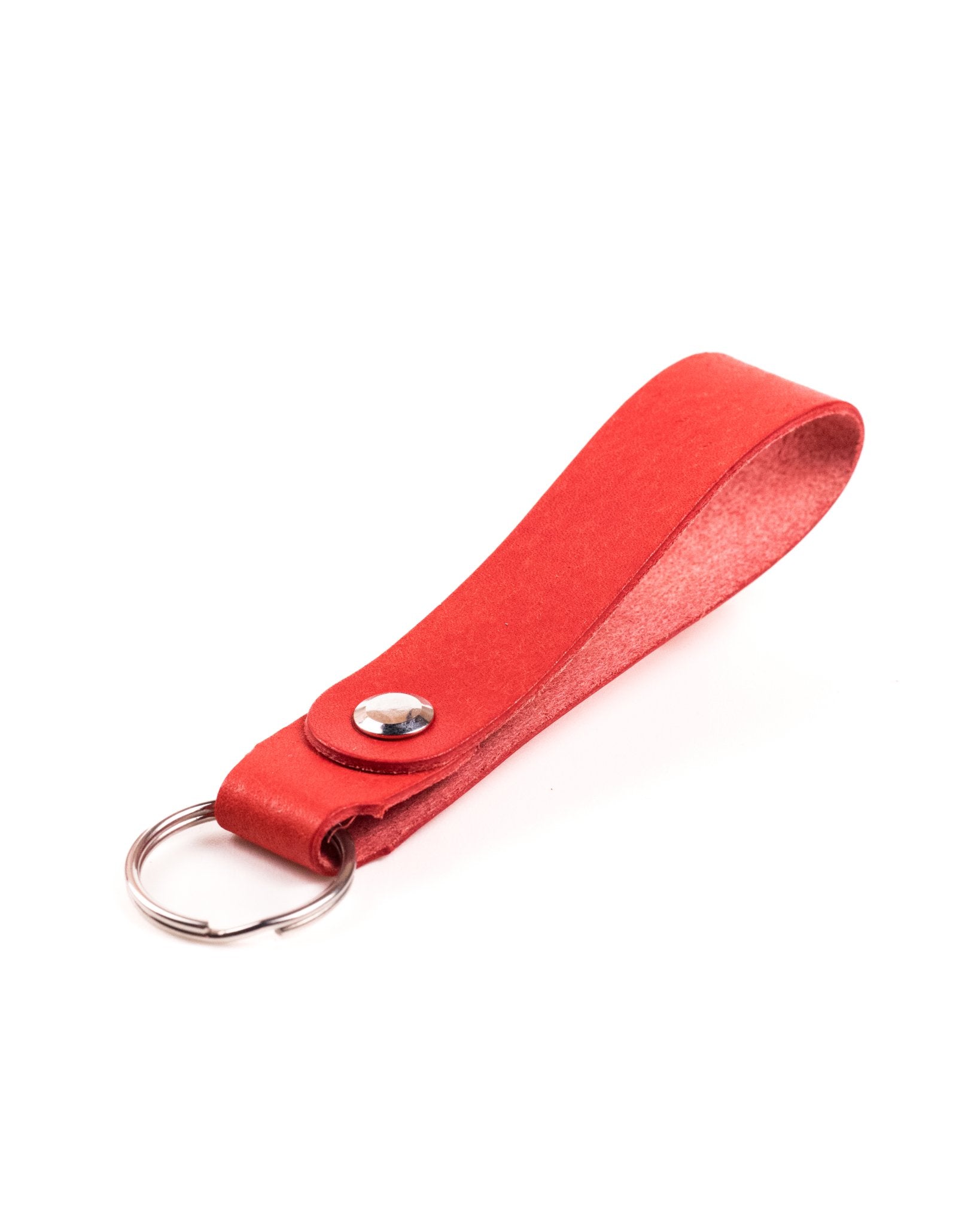 red italian leather keyring with silver hardware on a white background