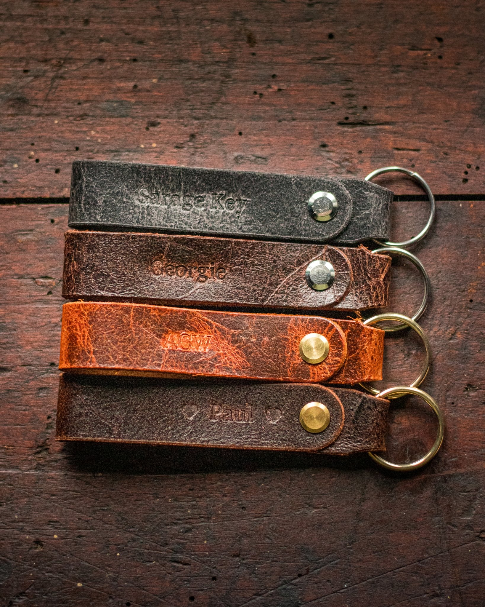 personalised leather keyrings in multiple muted colours