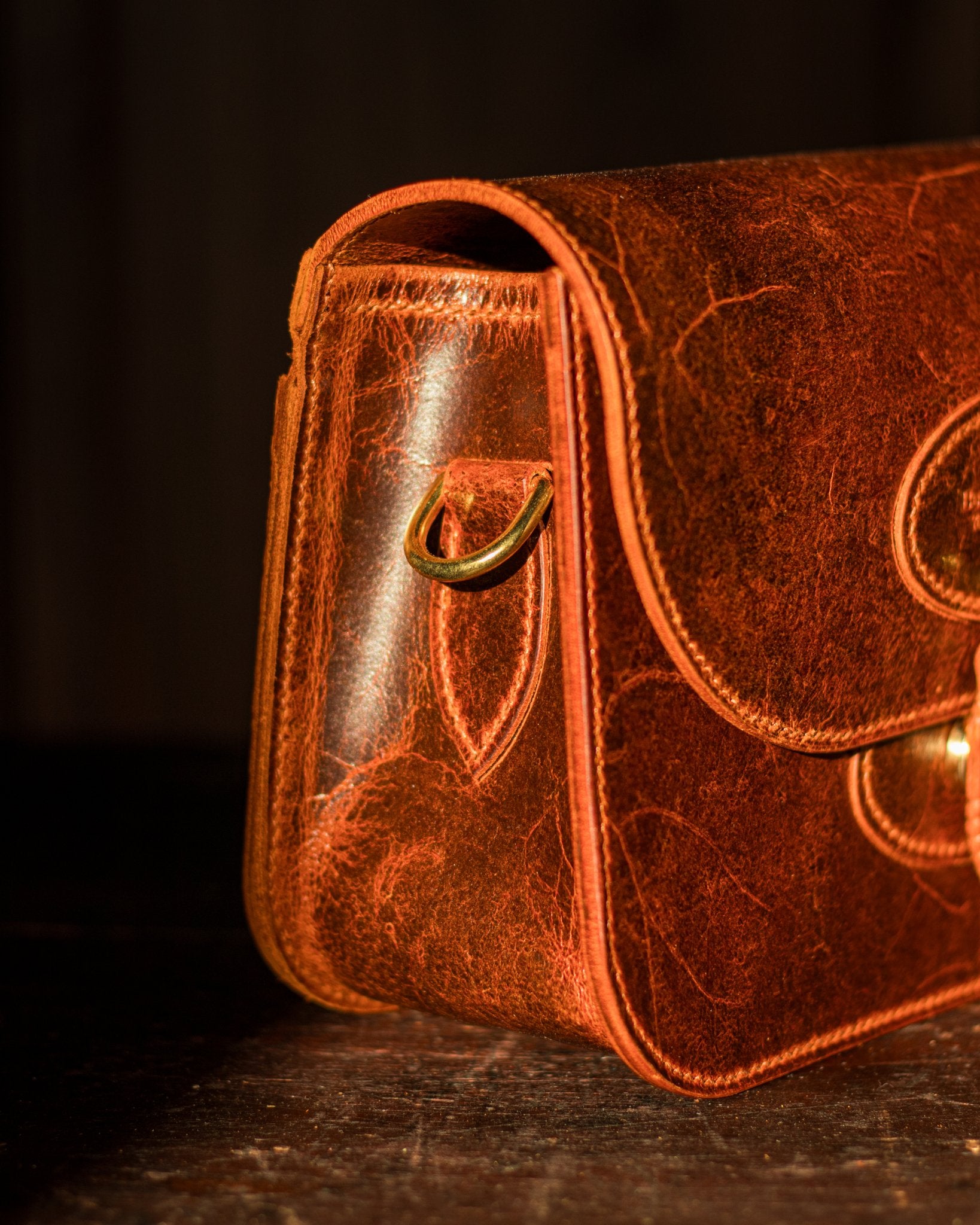 golden sunny picture of a brass d ring