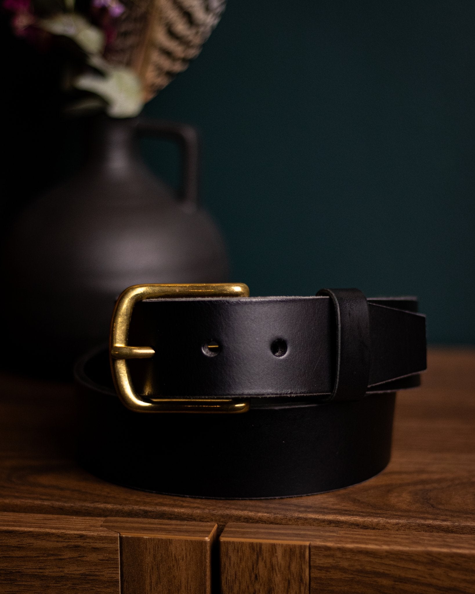 Black handmade leather belt with traditional brass buckle