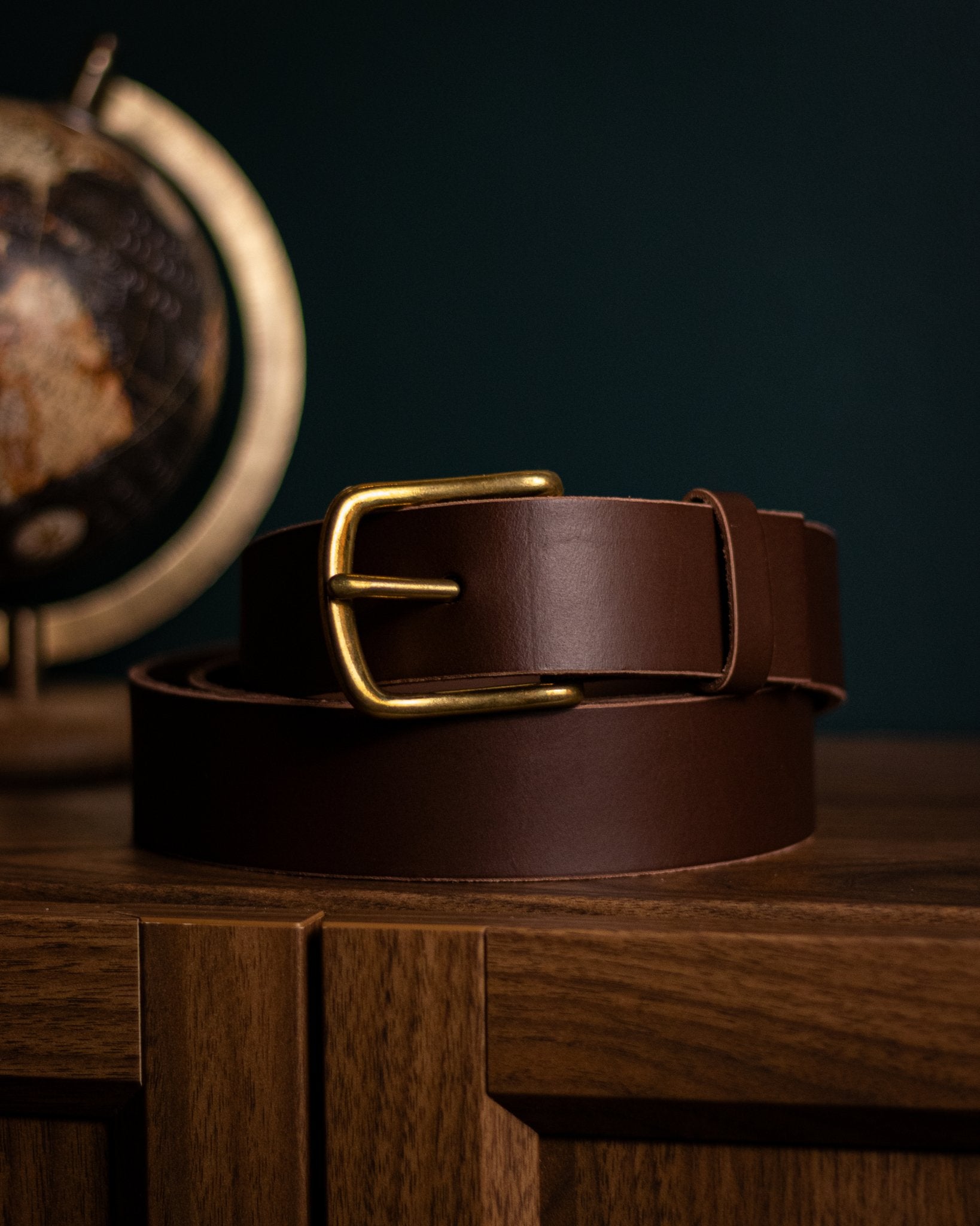 Brown handmade leather belt with traditional brass buckle