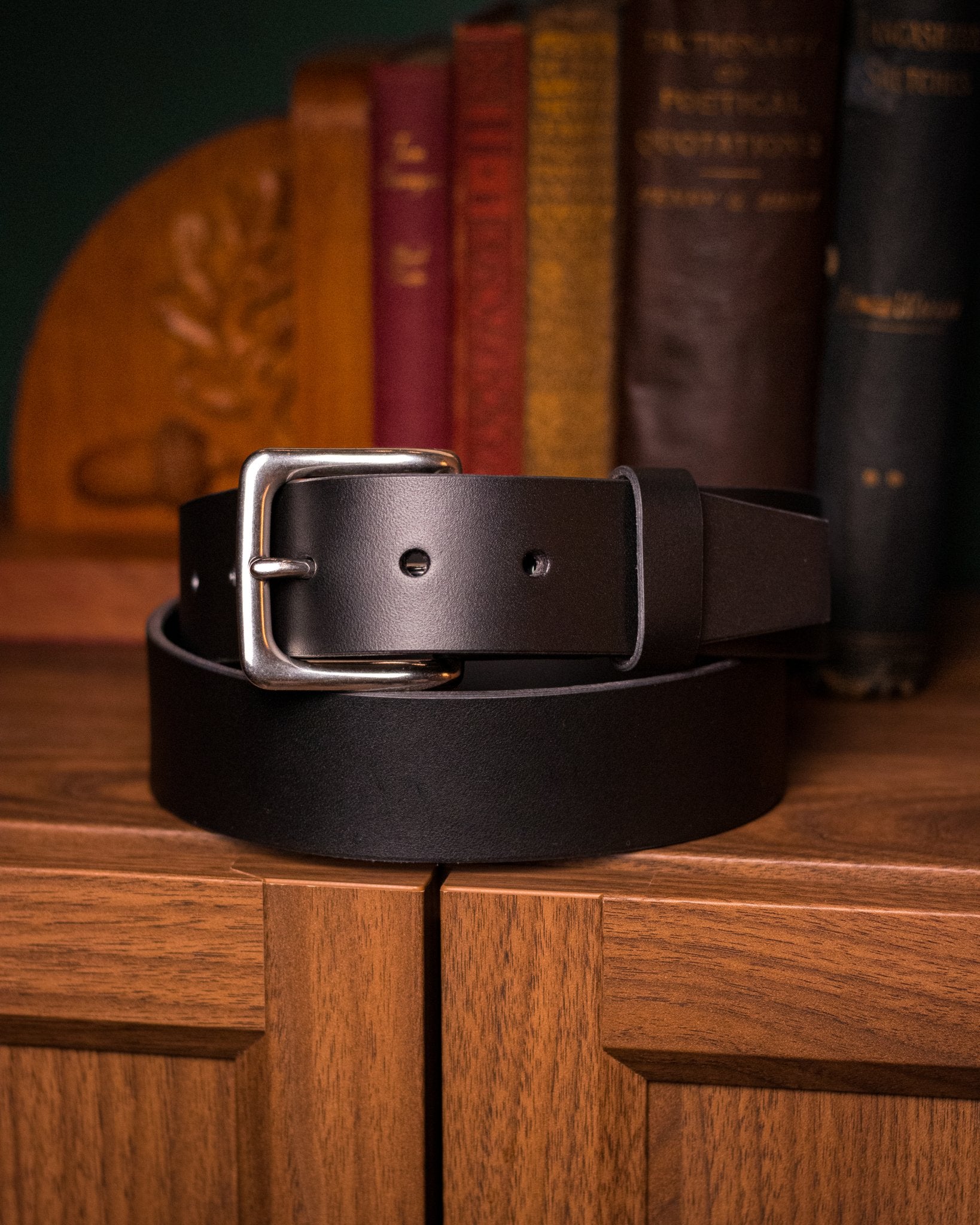 Handmade leather belt in rich black full-grain Italian leather with polished buckle