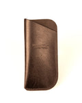 Distressed Black Leather Glasses Case on White Background