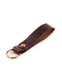 Brown Distressed leather keyring with brass hardware on a white background