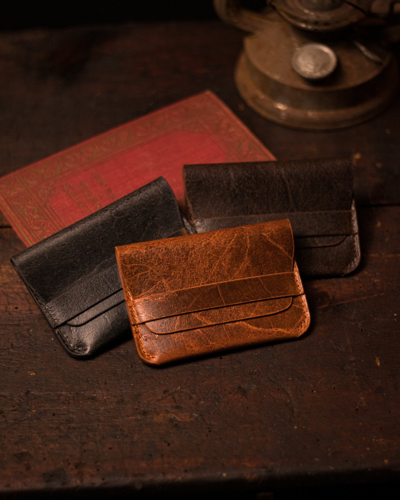 Distressed Leather Cardholder Trio Collection On Table