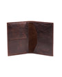 distressed brown leather passport cover on a white background