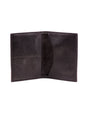 distressed black leather passport cover on a white background