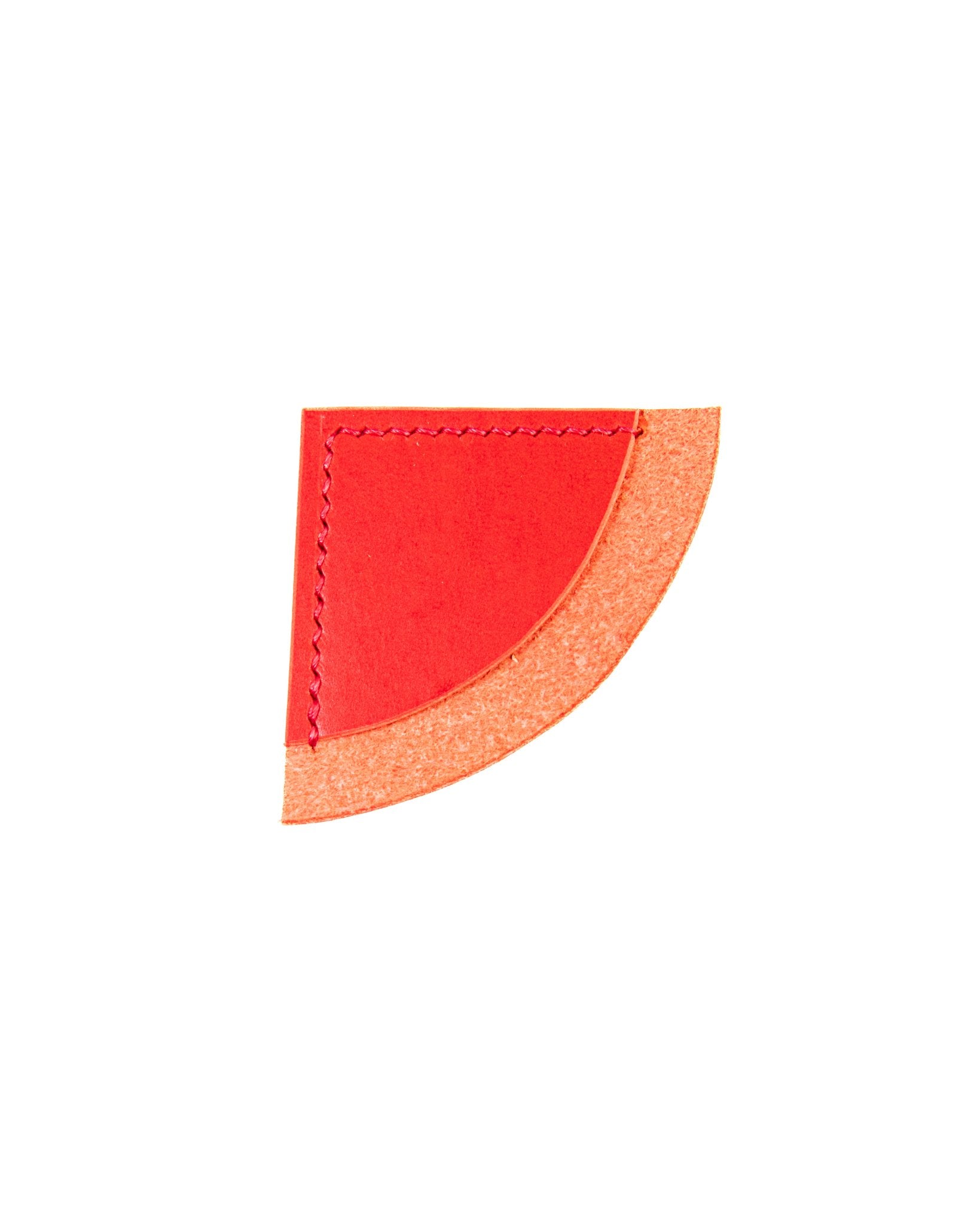 Red leather bookmark on a white background