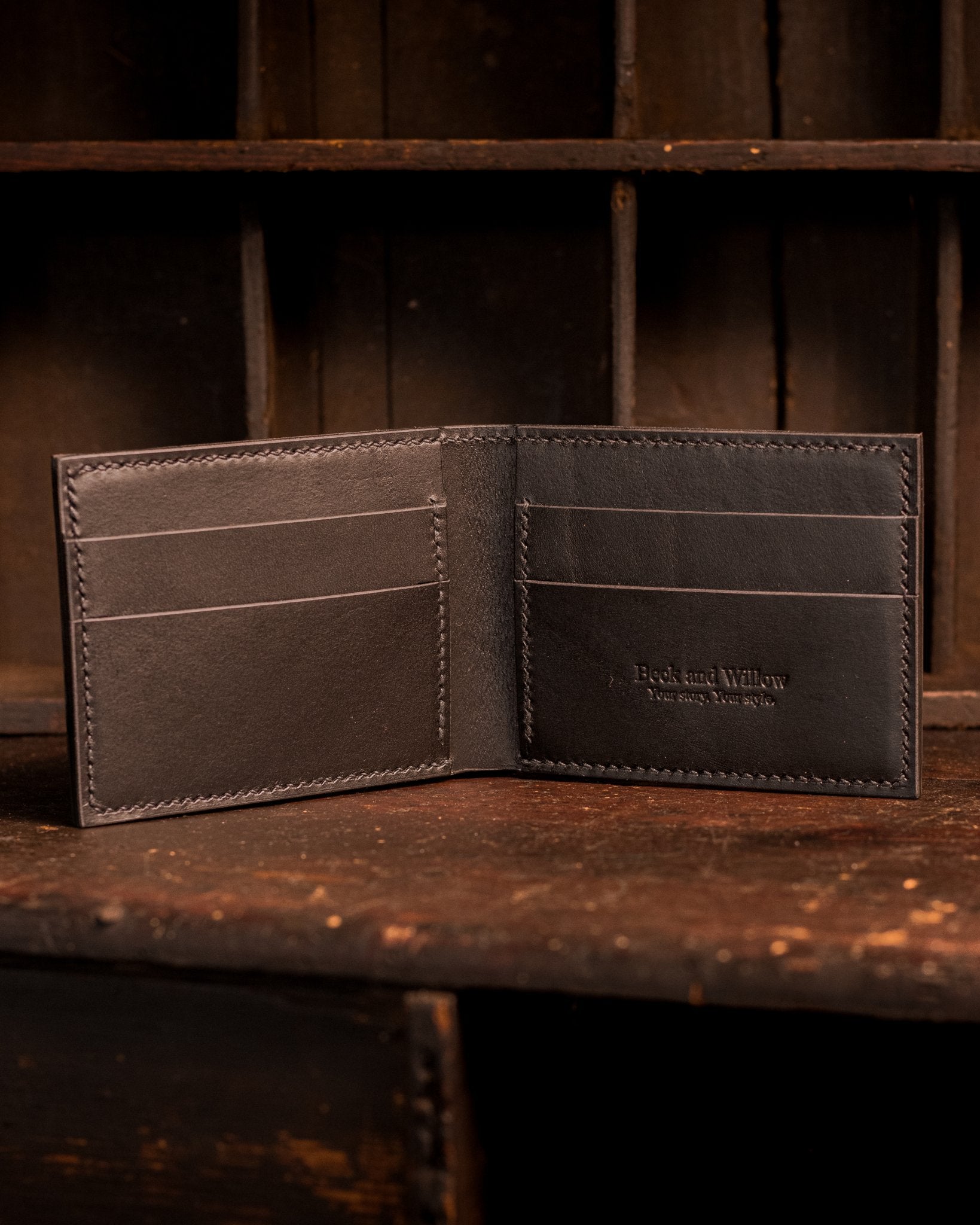 opened black italian leather bifold wallet lifestyle picture