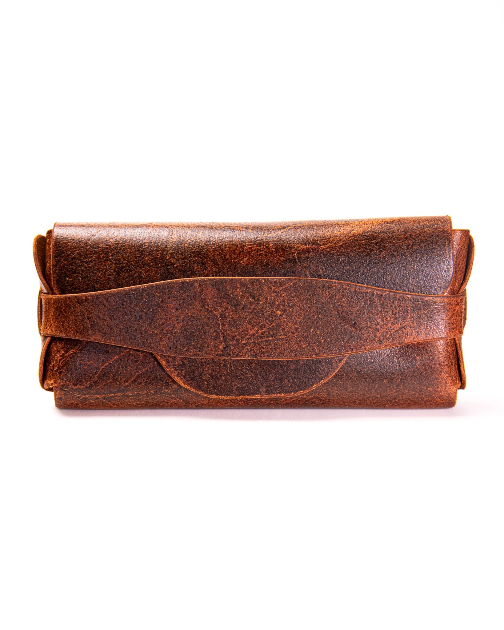 Tan leather sunglasses case on a white background