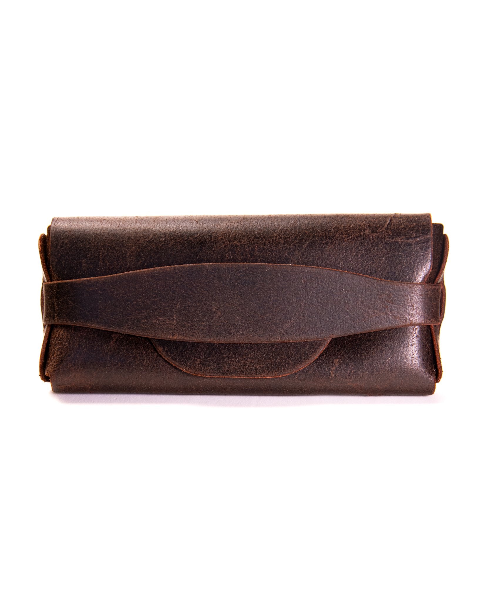 Brown leather sunglasses case on a white background